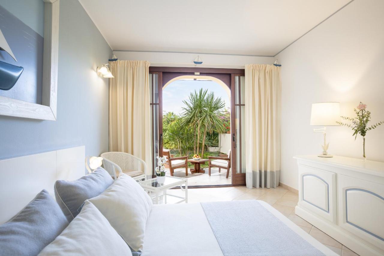 Hotel Baia Di Nora Pula Extérieur photo