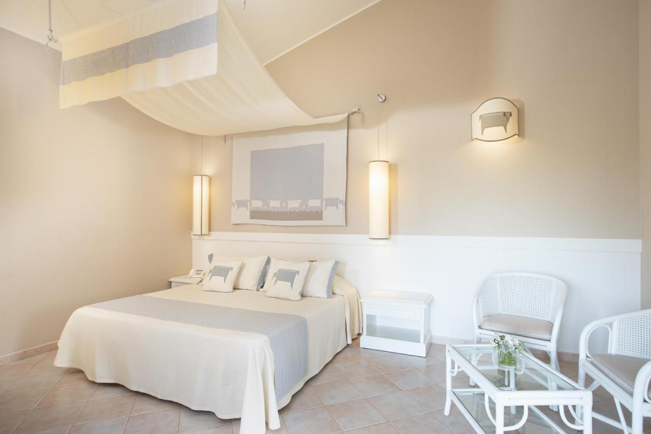 Hotel Baia Di Nora Pula Extérieur photo