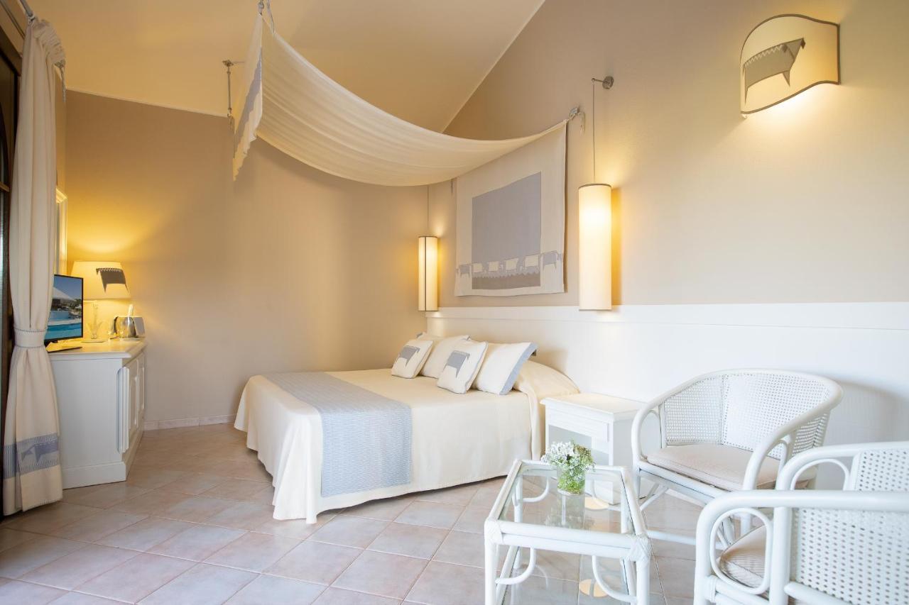 Hotel Baia Di Nora Pula Extérieur photo